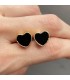 Aretes ónix en forma de corazón